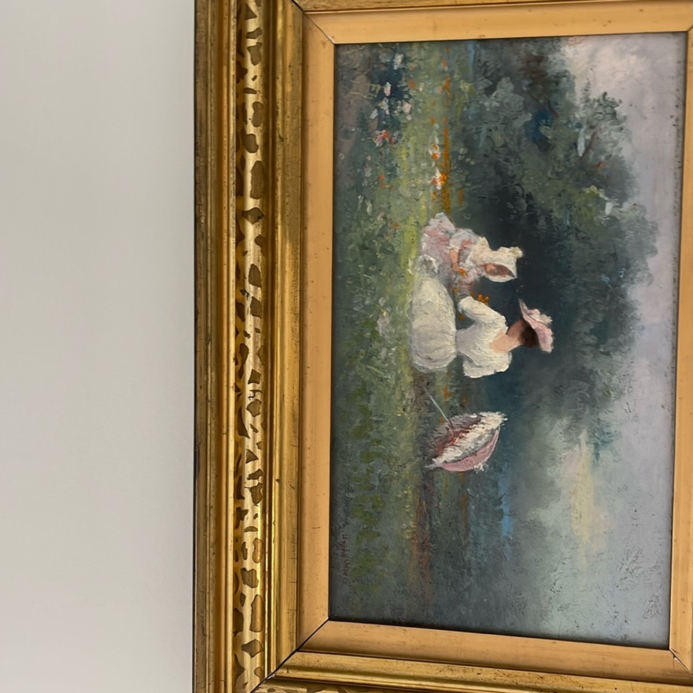 Oil on canvas of mother and child. Signed but can’t read it